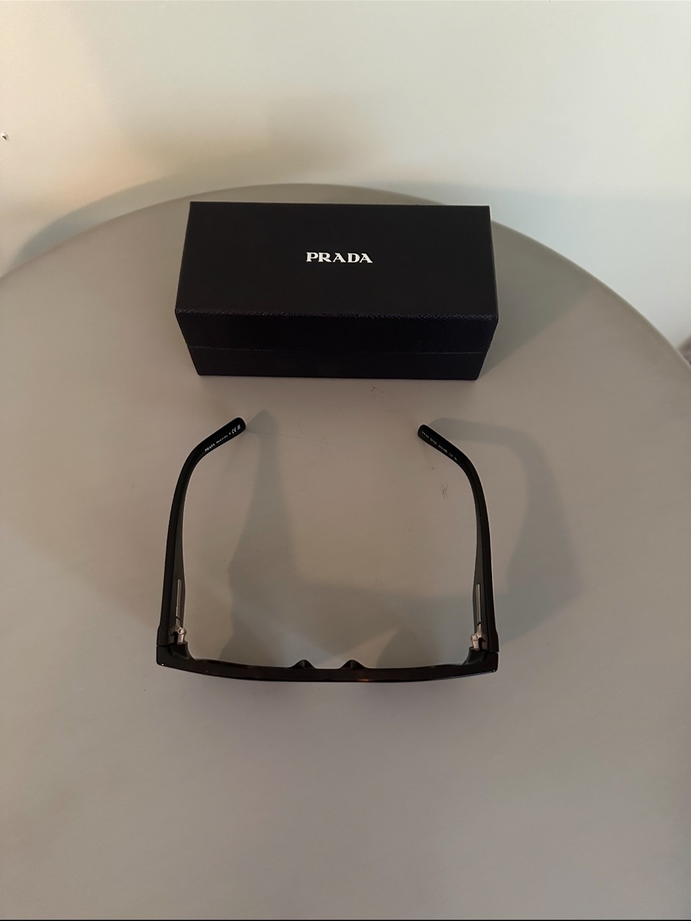 Prada sunglasses! I don’t have a case but have the original box they came in!